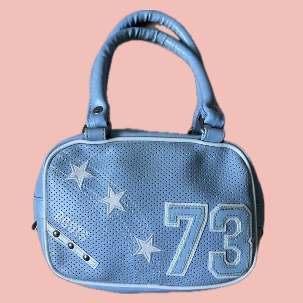 Vintage Roots bowling-style handbag in soft baby blue faux leather